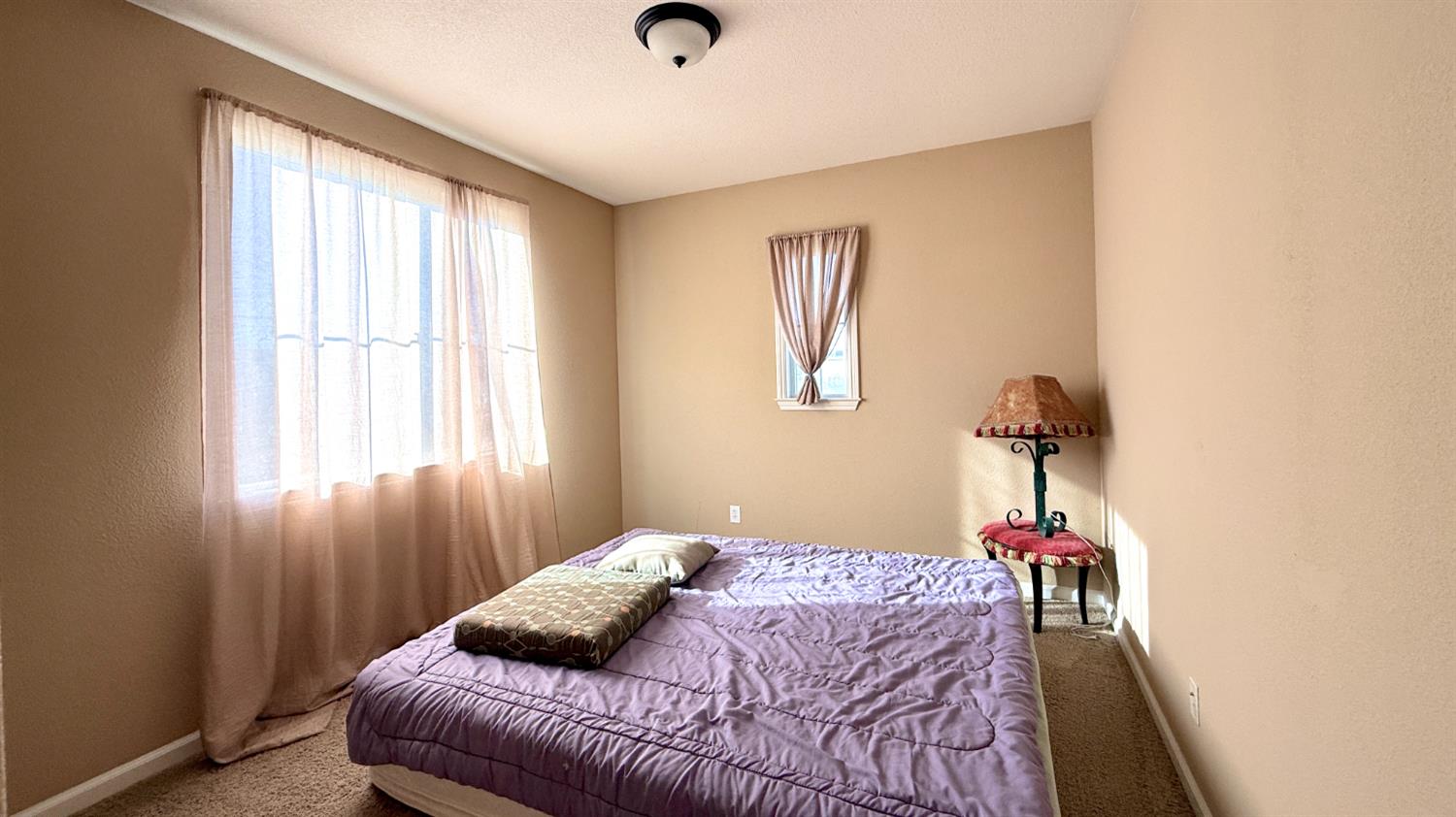 16206 Sand Bar Way Lathrop, CA 95330 - Photo 24 of 32 a bedroom with a bed and a window