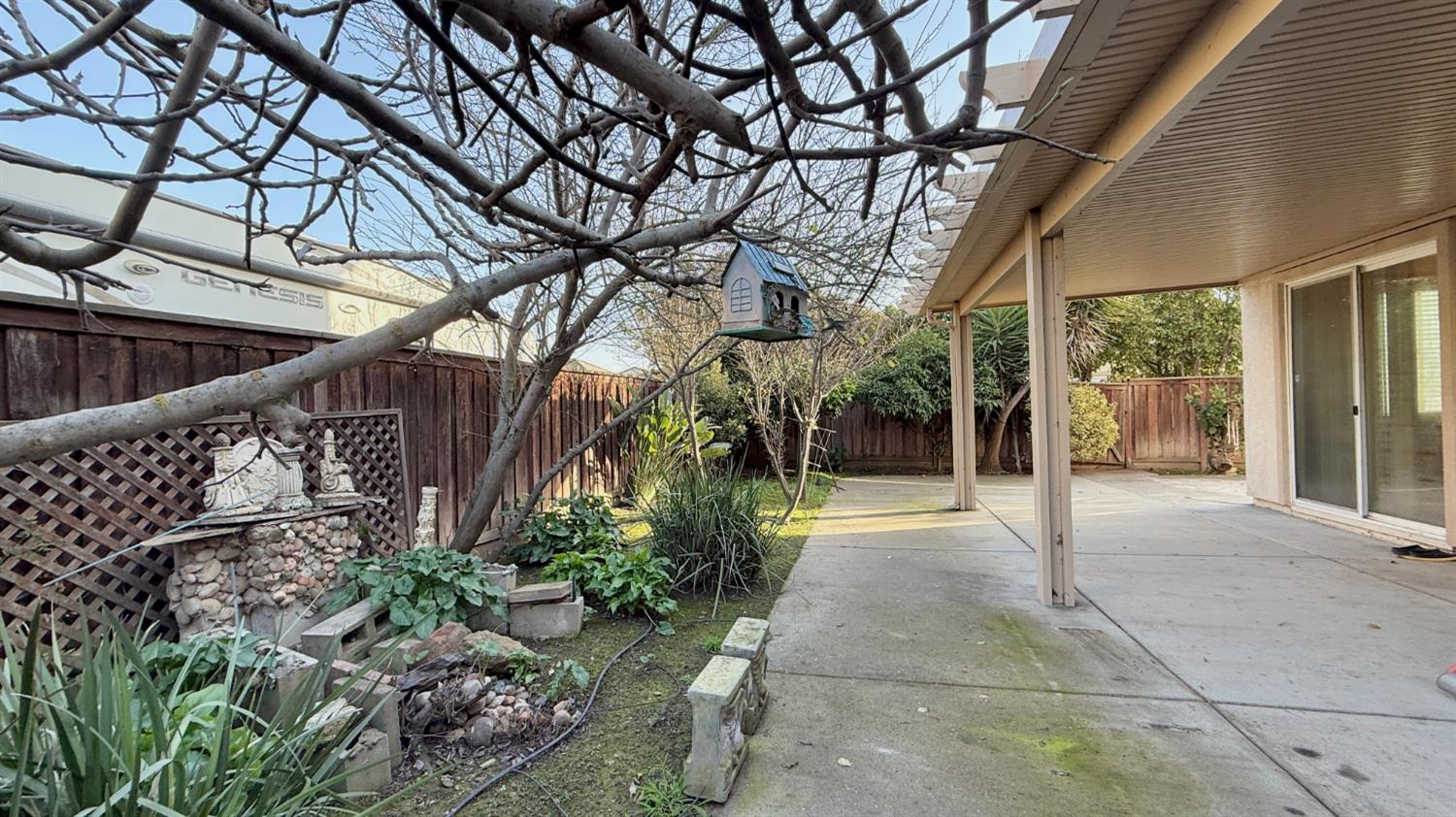 16206 Sand Bar Way Lathrop, CA 95330 - Photo 30 of 32 a view of a pathway of a house with a tree