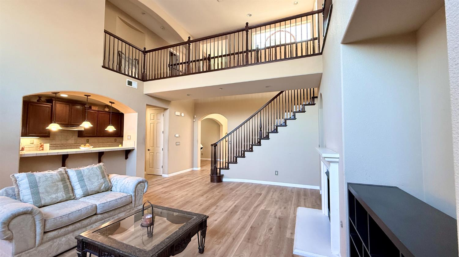 16206 Sand Bar Way Lathrop, CA 95330 - Photo 7 of 32 a living room with furniture and wooden floor