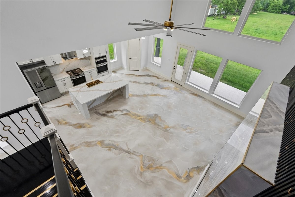 3237 Harkey Road Pearland, TX 77584 - Photo 24 of 46 Incredible second-story view overlooking the open-concept living space.