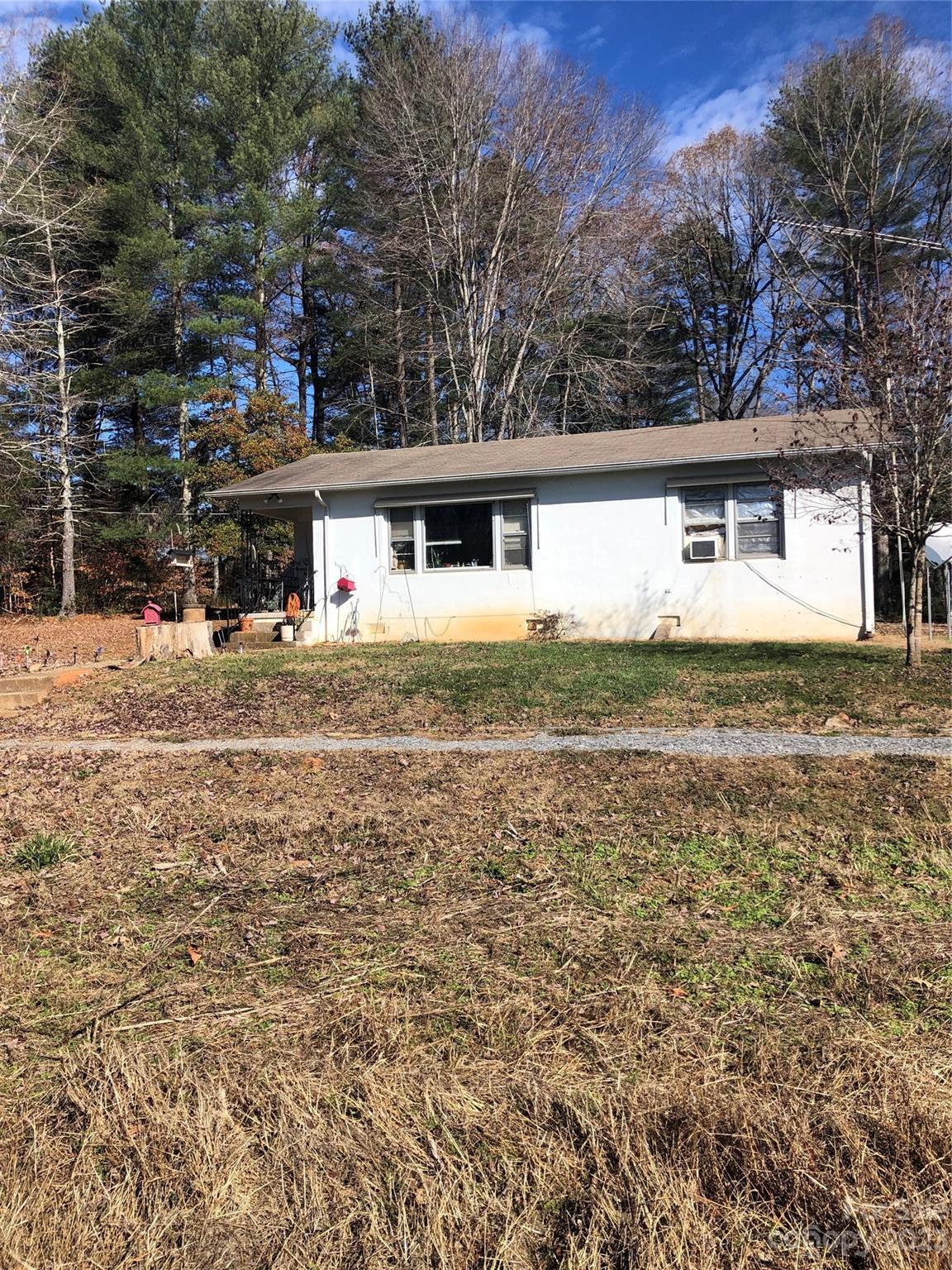 a front view of a house with yard
