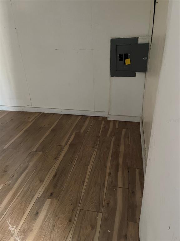 16148 Boca Raton Street Brooksville, FL 34604 - Photo 7 of 7 a view of wooden floor
