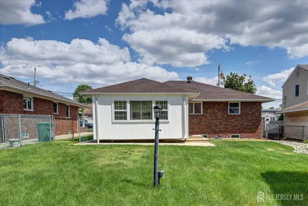 a view of a yard in front of a house