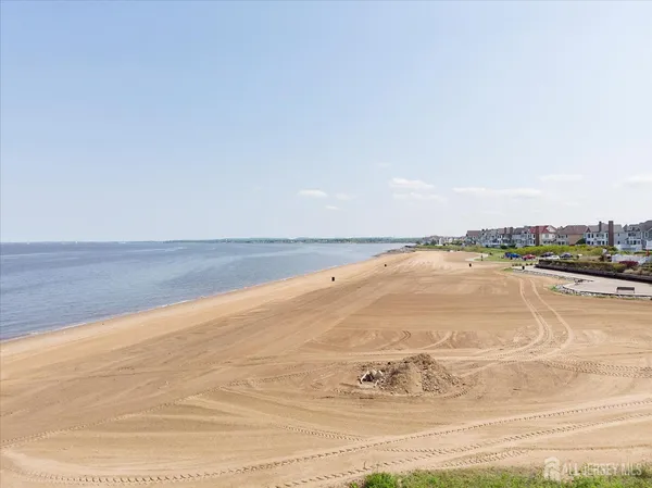 a view of an ocean and city