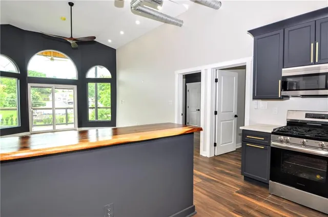 a kitchen with stainless steel appliances and a sink