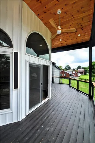 a view of a street with wooden floor