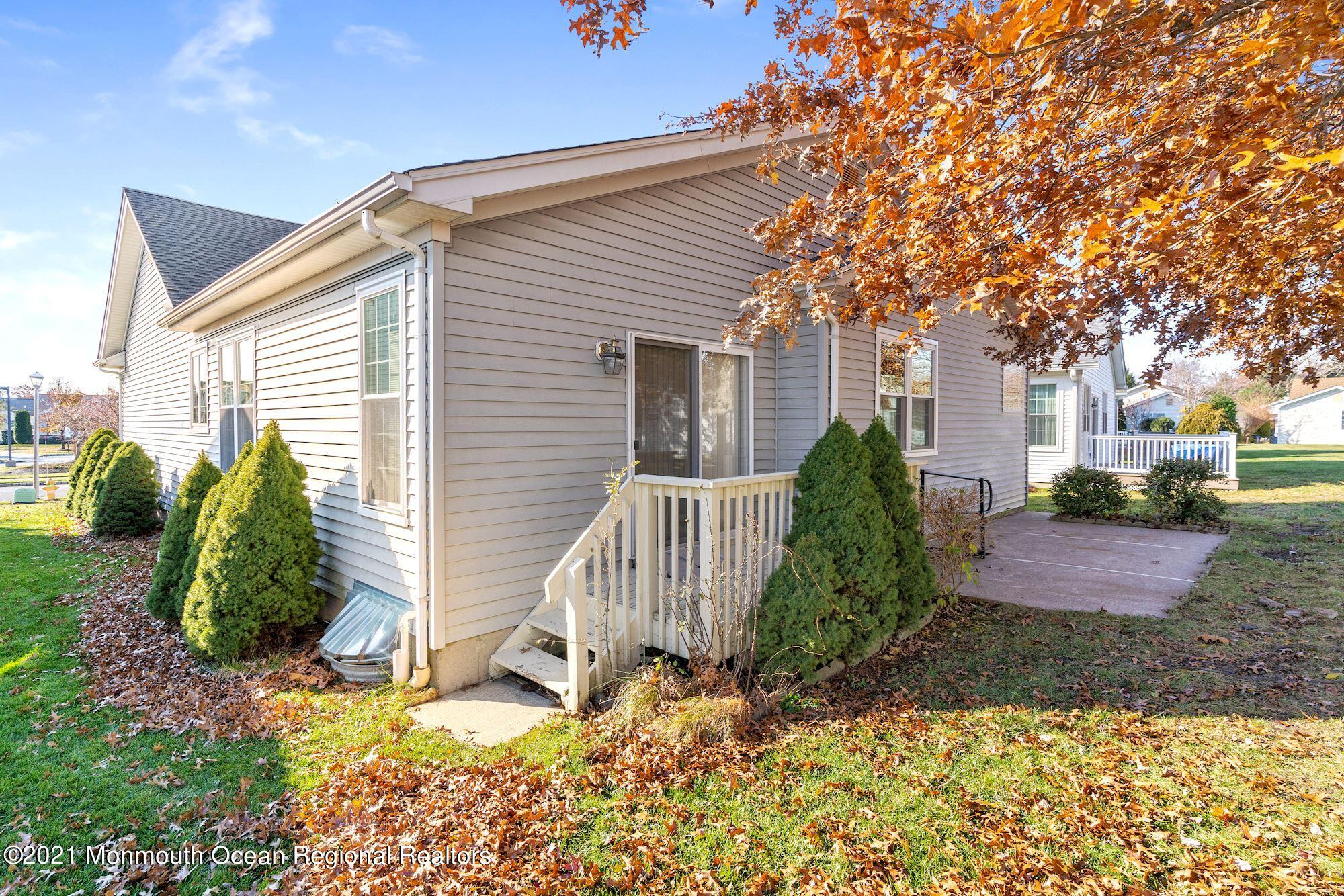 81 Byron Road Brick, NJ 08724 - Photo 11 of 51 a view of a house with a yard and plants