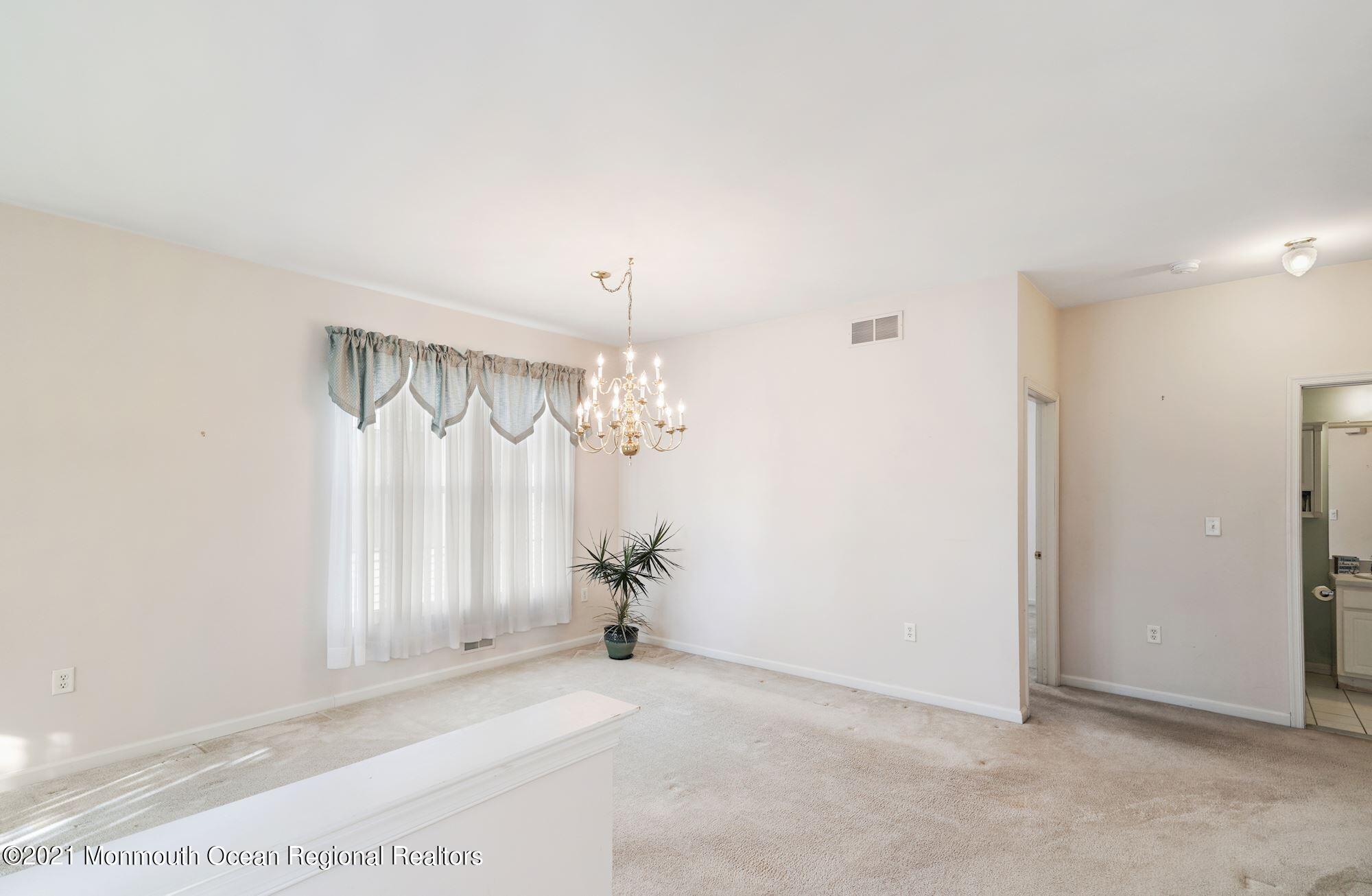 81 Byron Road Brick, NJ 08724 - Photo 12 of 51 an empty room with windows and entrance