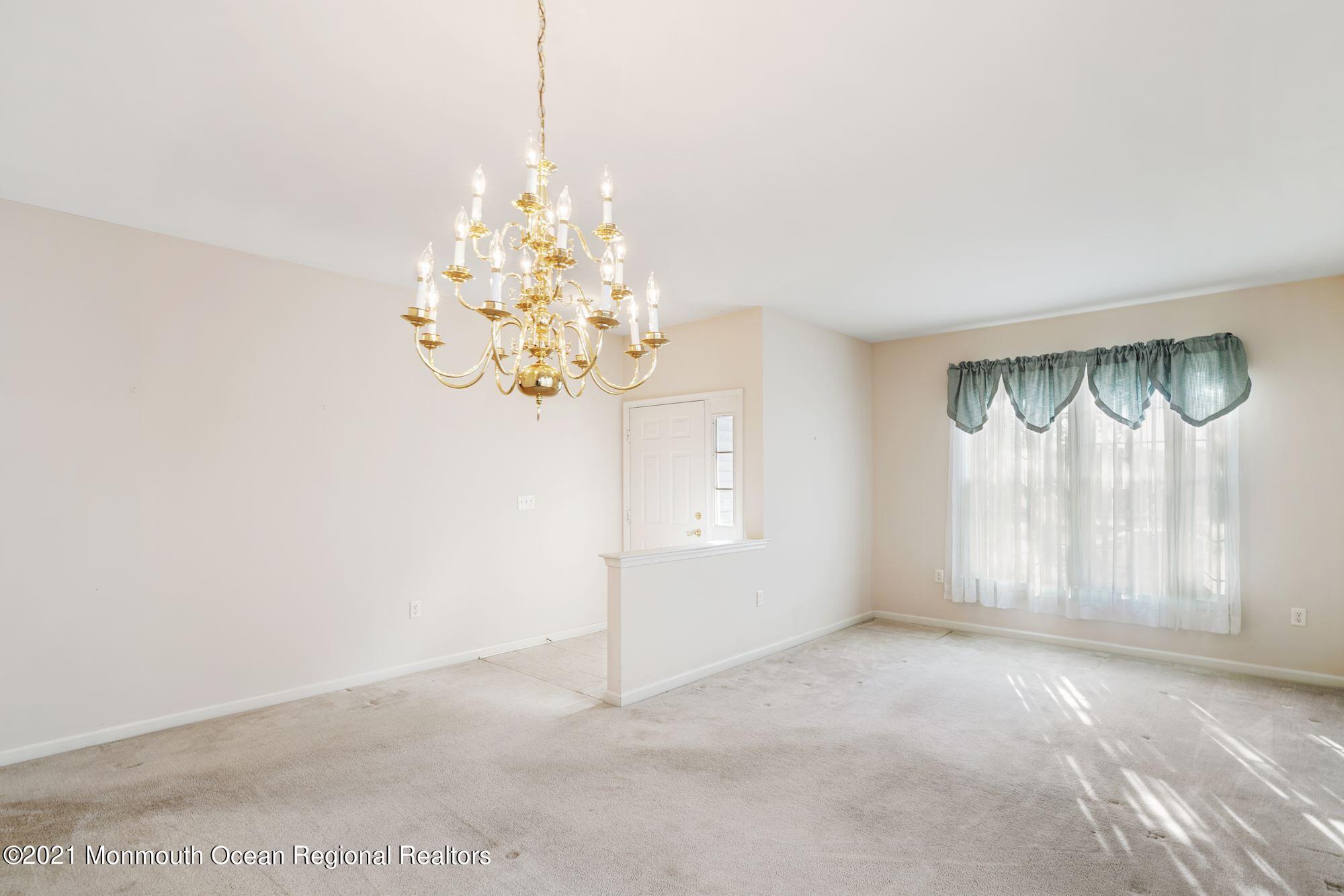 81 Byron Road Brick, NJ 08724 - Photo 13 of 51 a view of an empty room with a window
