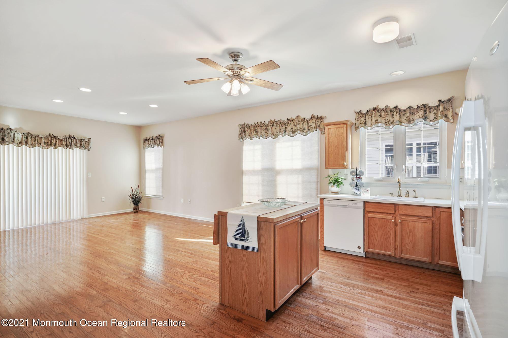 81 Byron Road Brick, NJ 08724 - Photo 15 of 51 a view of a kitchen with a sink wooden floor and a window
