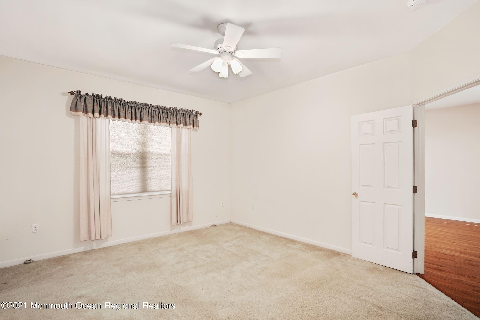 81 Byron Road Brick, NJ 08724 - Photo 28 of 51 an empty room with windows and fan