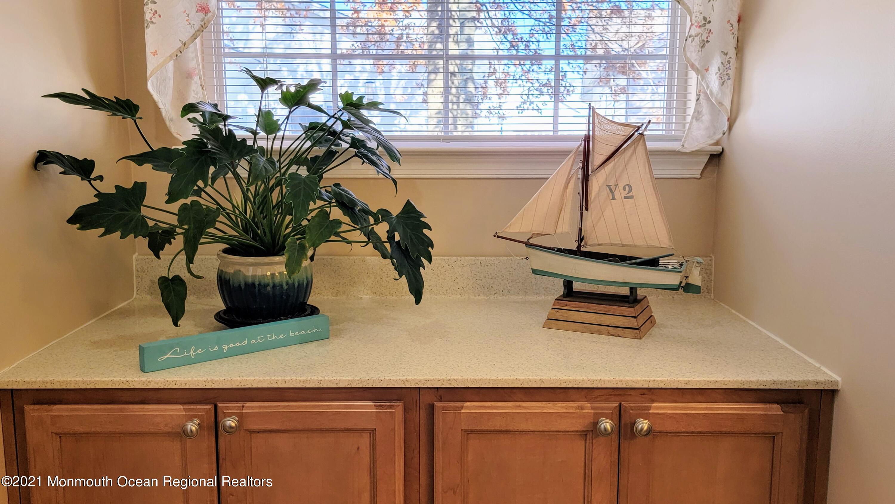 81 Byron Road Brick, NJ 08724 - Photo 35 of 51 a vase of flowers sitting on a table