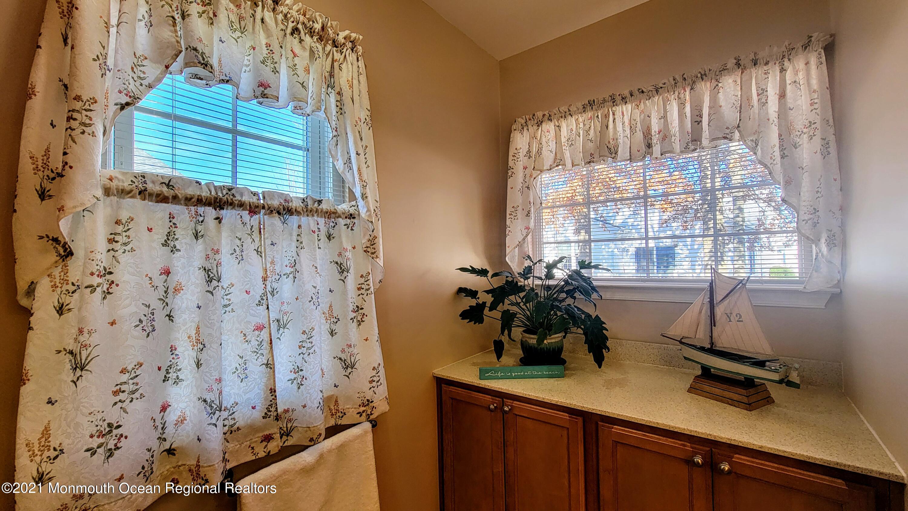 81 Byron Road Brick, NJ 08724 - Photo 36 of 51 a view of a room with a window and flower pot