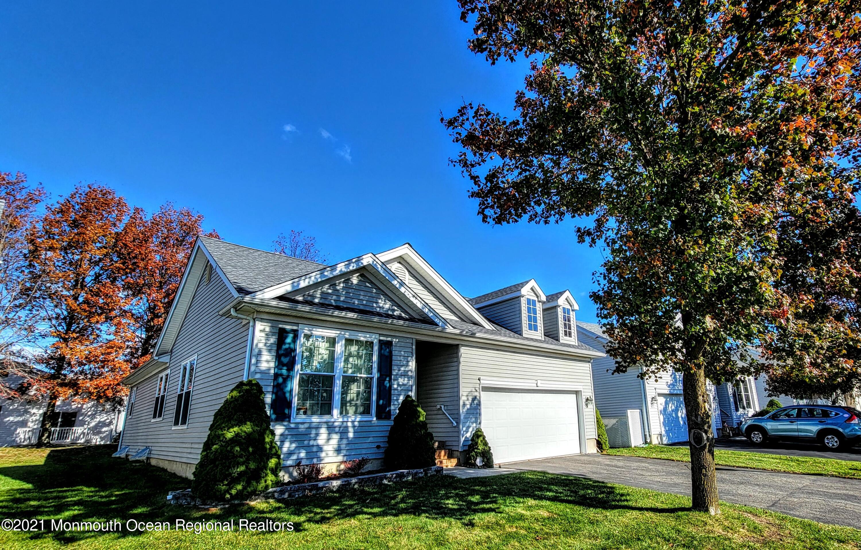 81 Byron Road Brick, NJ 08724 - Photo 5 of 51 a front view of a house with a yard