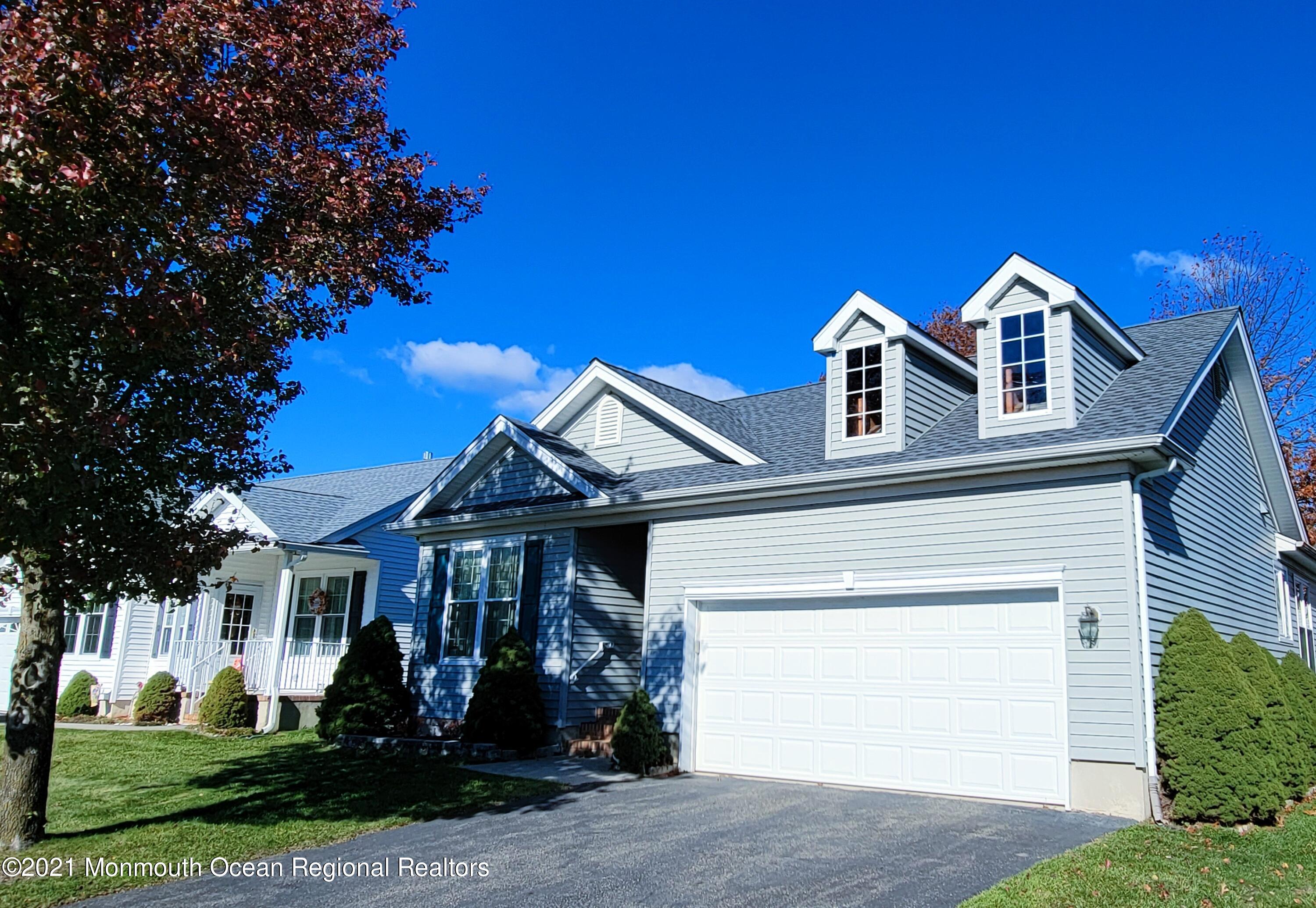 81 Byron Road Brick, NJ 08724 - Photo 6 of 51 a front view of a house with garden