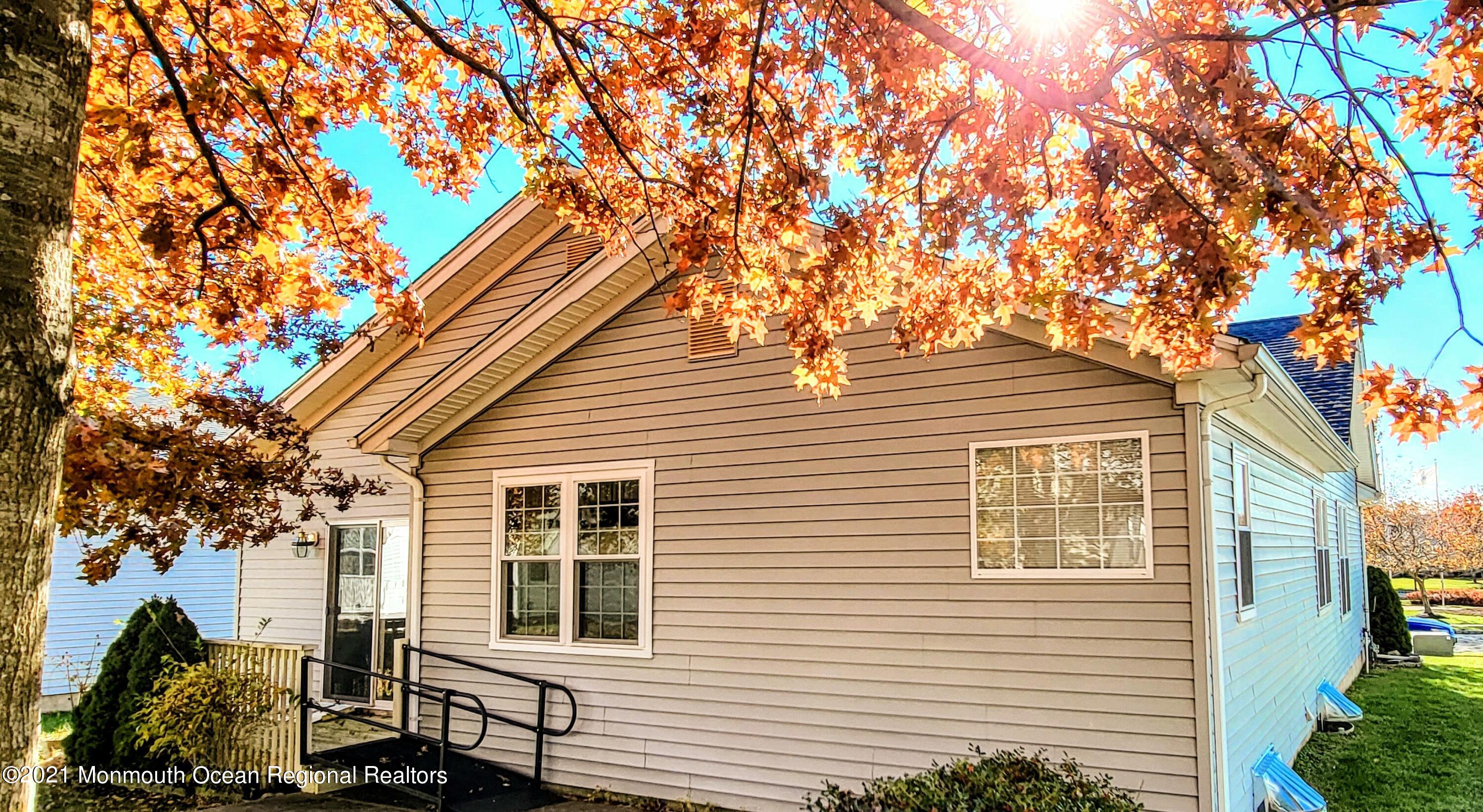 81 Byron Road Brick, NJ 08724 - Photo 8 of 51 a front view of a house with a tree