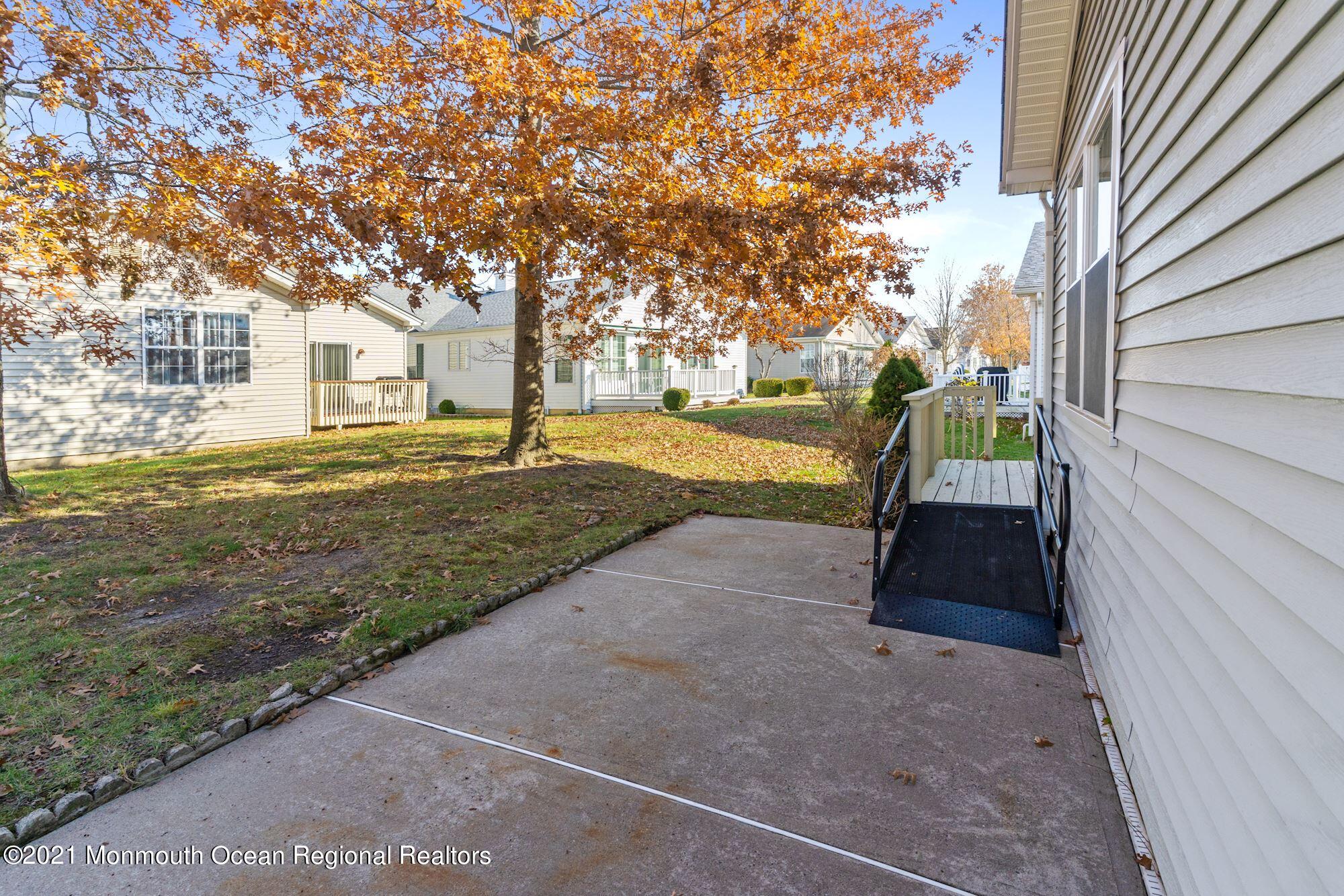 81 Byron Road Brick, NJ 08724 - Photo 9 of 51 a view of a yard with wooden fence