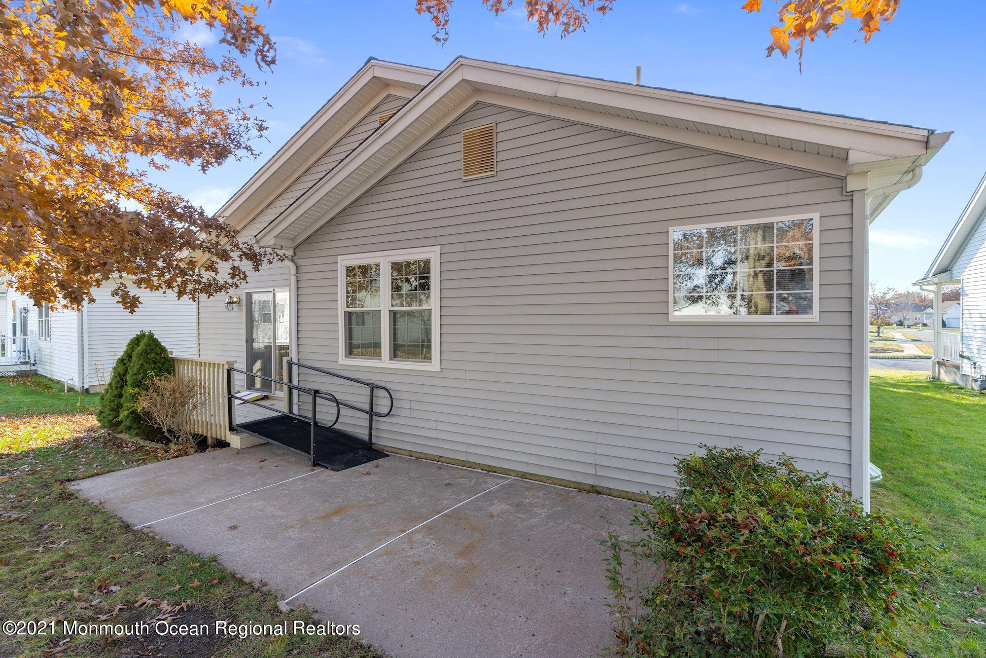 81 Byron Road Brick, NJ 08724 - Photo 10 of 51 a view of backyard with a garden and trees