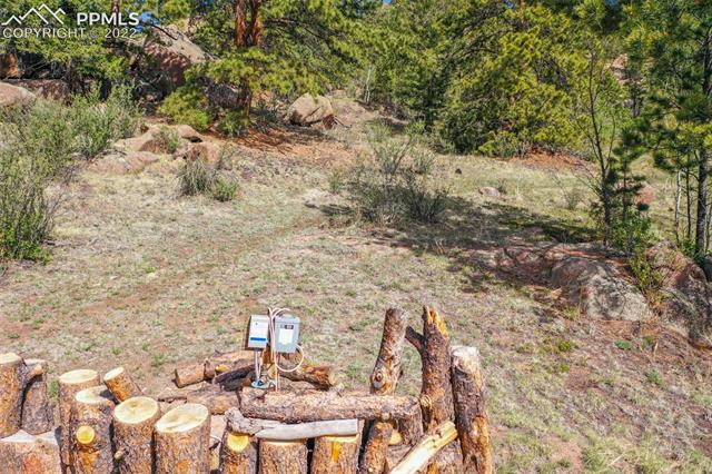 339 Chipper Road Guffey, CO 80820 - Photo 8 of 34 Existing well head and pump.