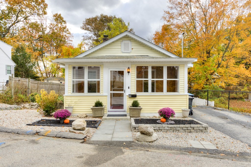 a front view of a house with a garage