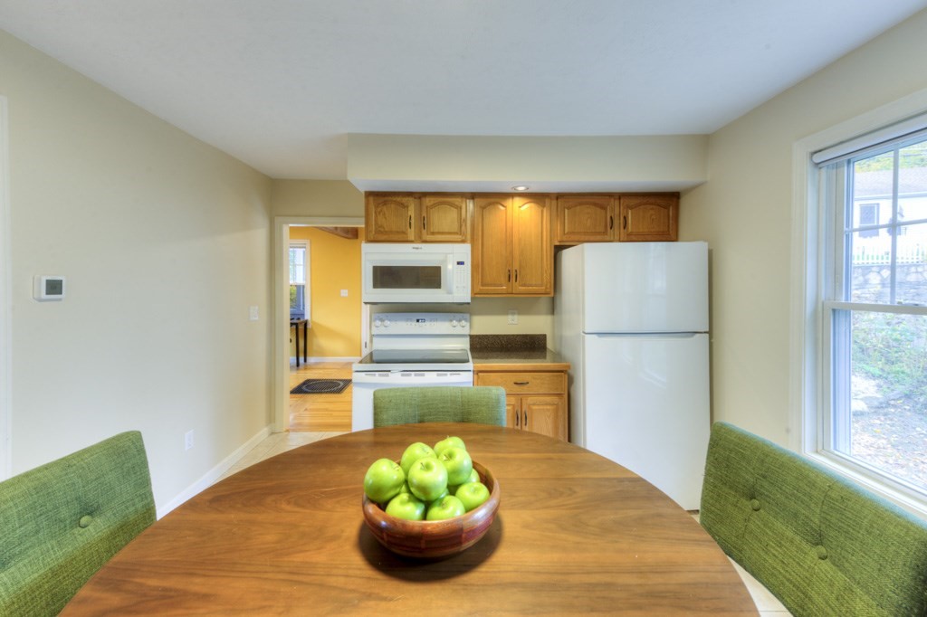 20 Alpine Trail Auburn, MA 01501 - Photo 22 of 40 a view of kitchen with furniture and wooden floor