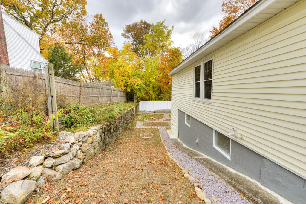 20 Alpine Trail Auburn, MA 01501 - Photo 34 of 40 a bathroom with a sink and mirror
