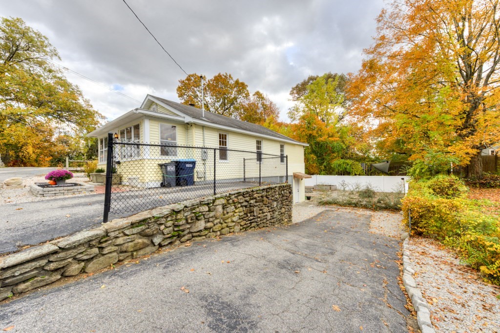 20 Alpine Trail Auburn, MA 01501 - Photo 39 of 40 a view of a house with a yard next to a road