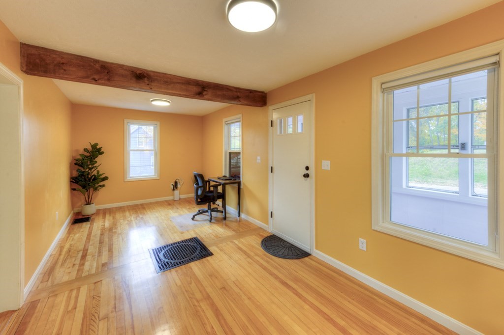 20 Alpine Trail Auburn, MA 01501 - Photo 6 of 40 a view of a room with wooden floor and furniture