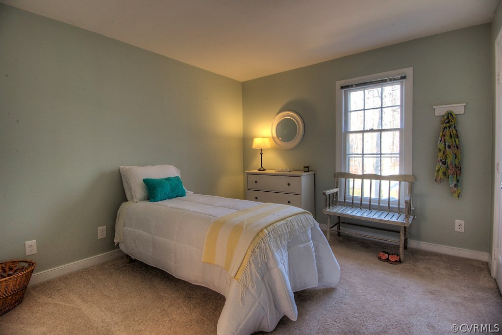 3121 East Brigstock Road Midlothian, VA 23113 - Photo 25 of 39 a bedroom with a bed and a window