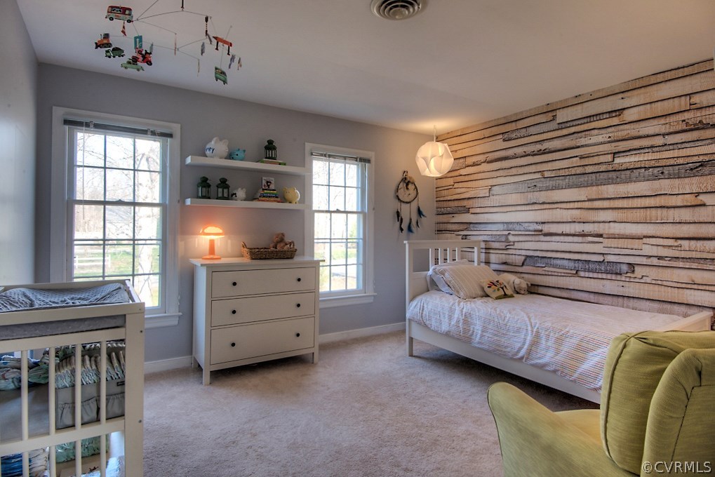 3121 East Brigstock Road Midlothian, VA 23113 - Photo 26 of 39 a bedroom with a bed and a window