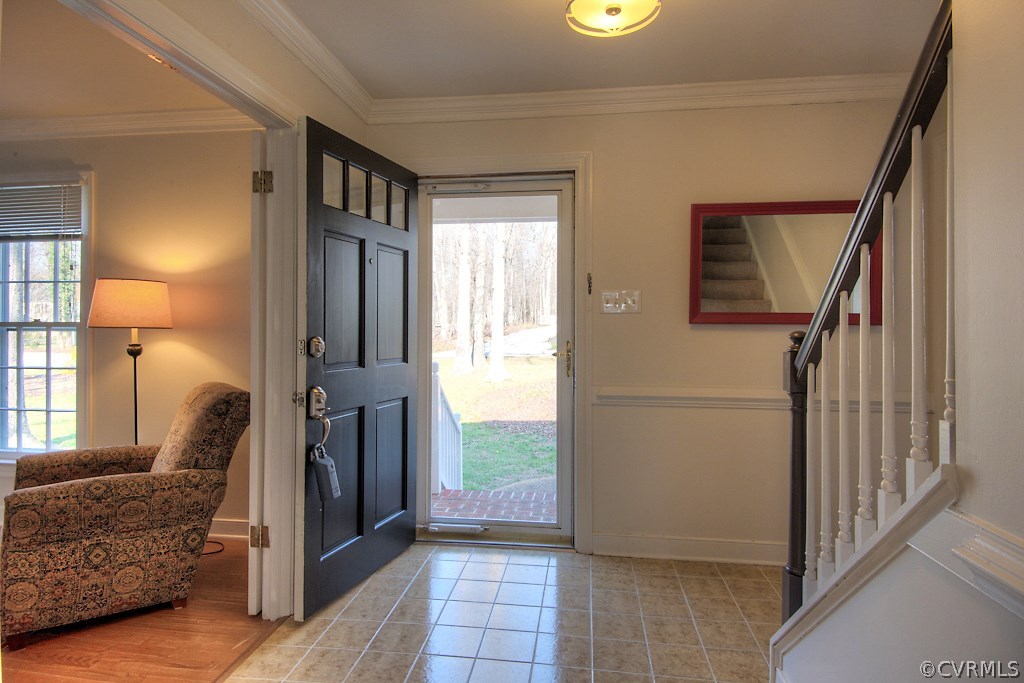 3121 East Brigstock Road Midlothian, VA 23113 - Photo 3 of 39 a living room with furniture and a window