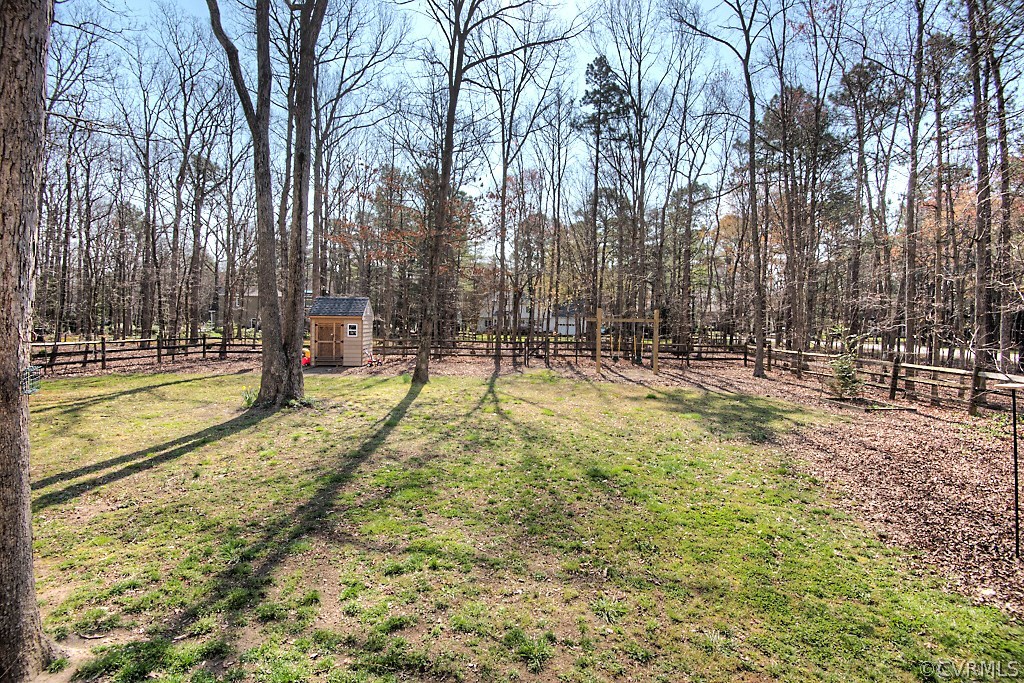 3121 East Brigstock Road Midlothian, VA 23113 - Photo 34 of 39 a view of yard with swimming pool and sitting area