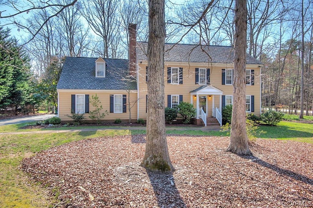 3121 East Brigstock Road Midlothian, VA 23113 - Photo 39 of 39 a front view of a house with garden