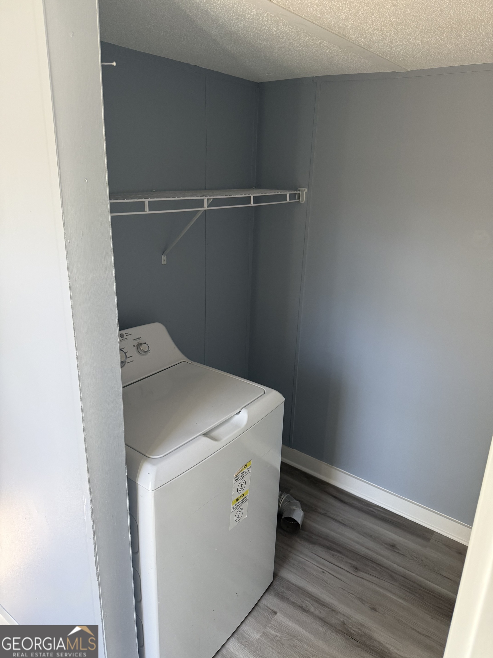 8410 Hawkinsville Road Macon, GA 31216 - Photo 17 of 22 a utility room with dryer and washer