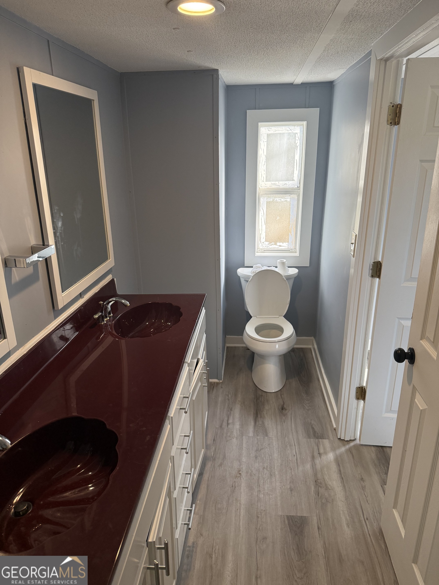 8410 Hawkinsville Road Macon, GA 31216 - Photo 21 of 22 a bathroom with a sink and a toilet