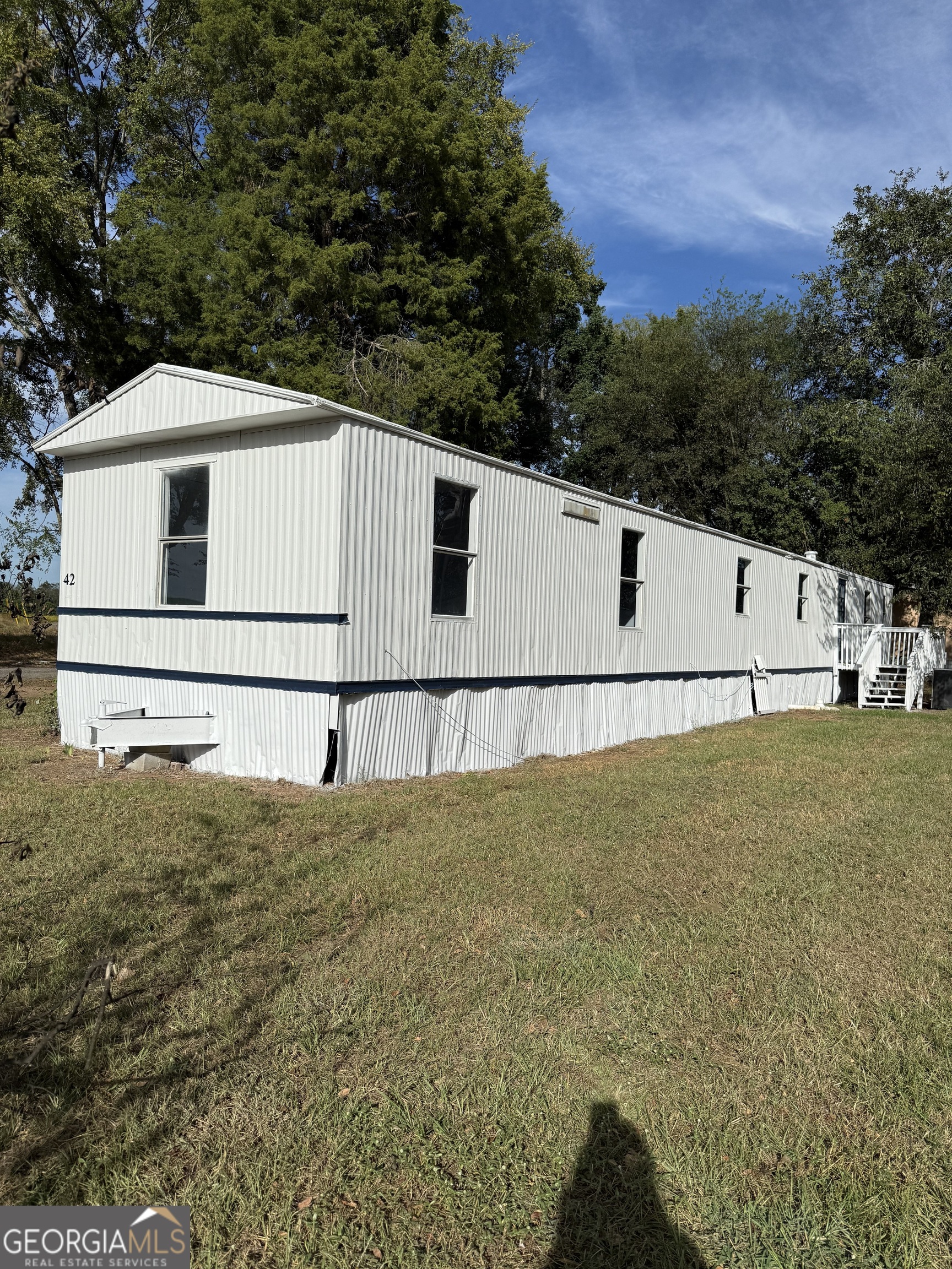 8410 Hawkinsville Road Macon, GA 31216 - Photo 4 of 22 a view of a big yard with an outdoor space