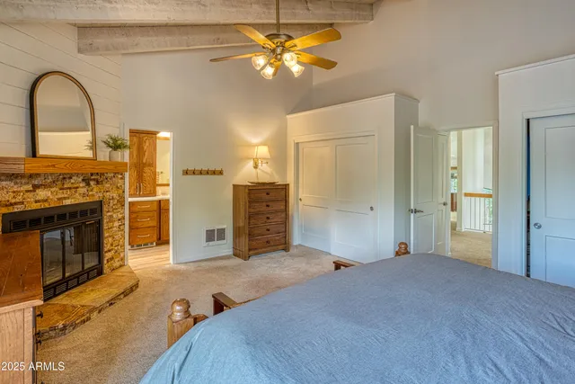 a view of a kitchen with a sink and a fireplace