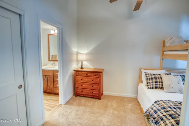 a view of bedroom with furniture and window