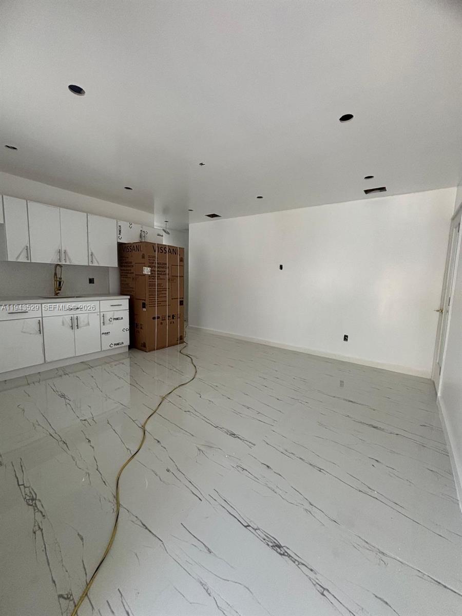 4380 Southwest 1st Street, Unit 1 Miami, FL 33134 - Photo 2 of 10 a view of storage and utility room