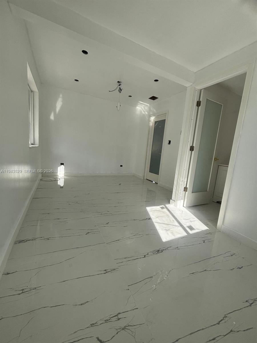 4380 Southwest 1st Street, Unit 1 Miami, FL 33134 - Photo 5 of 10 a view of entryway