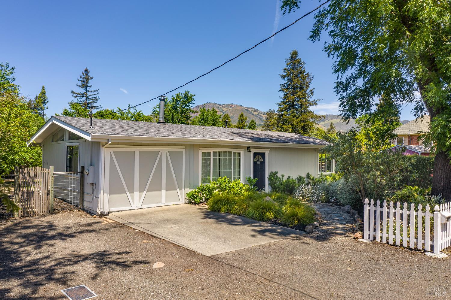 171 Randolph Avenue Kenwood, CA 95452 - Photo 1 of 56 front view of house with a yard