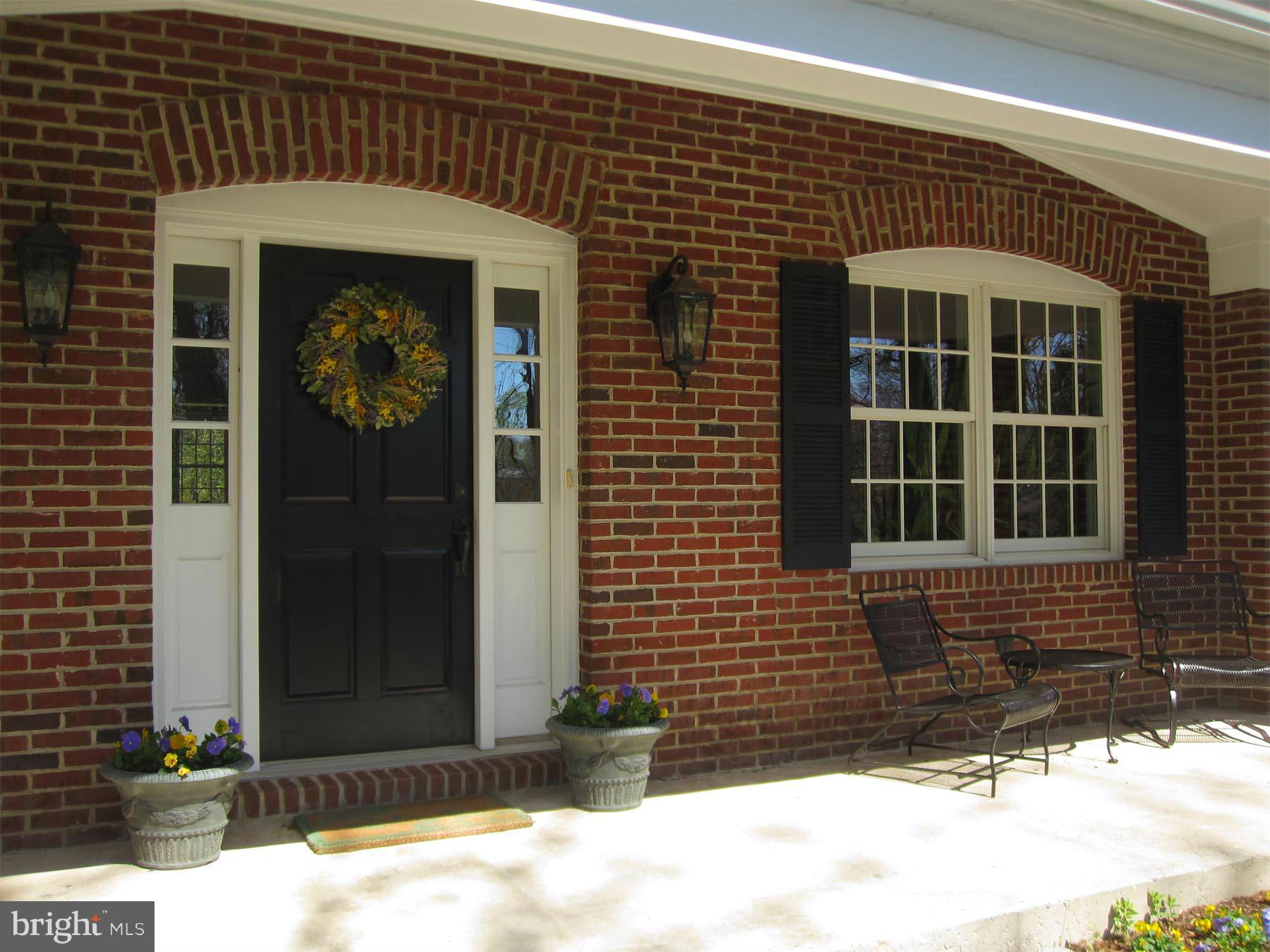 14511 Carrolton Road Rockville, MD 20853 - Photo 5 of 30 Front porch entrance and doorway