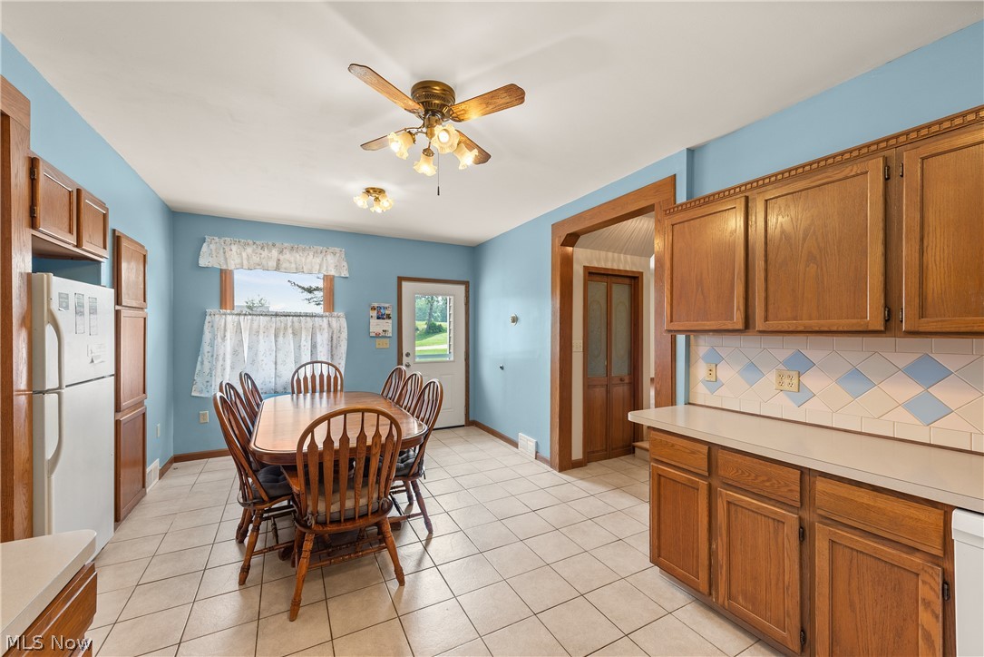 9990 Broadview Road Broadview Heights, OH 44147 - Photo 20 of 47 Dining space featuring ceiling fan and light tile patterned floors