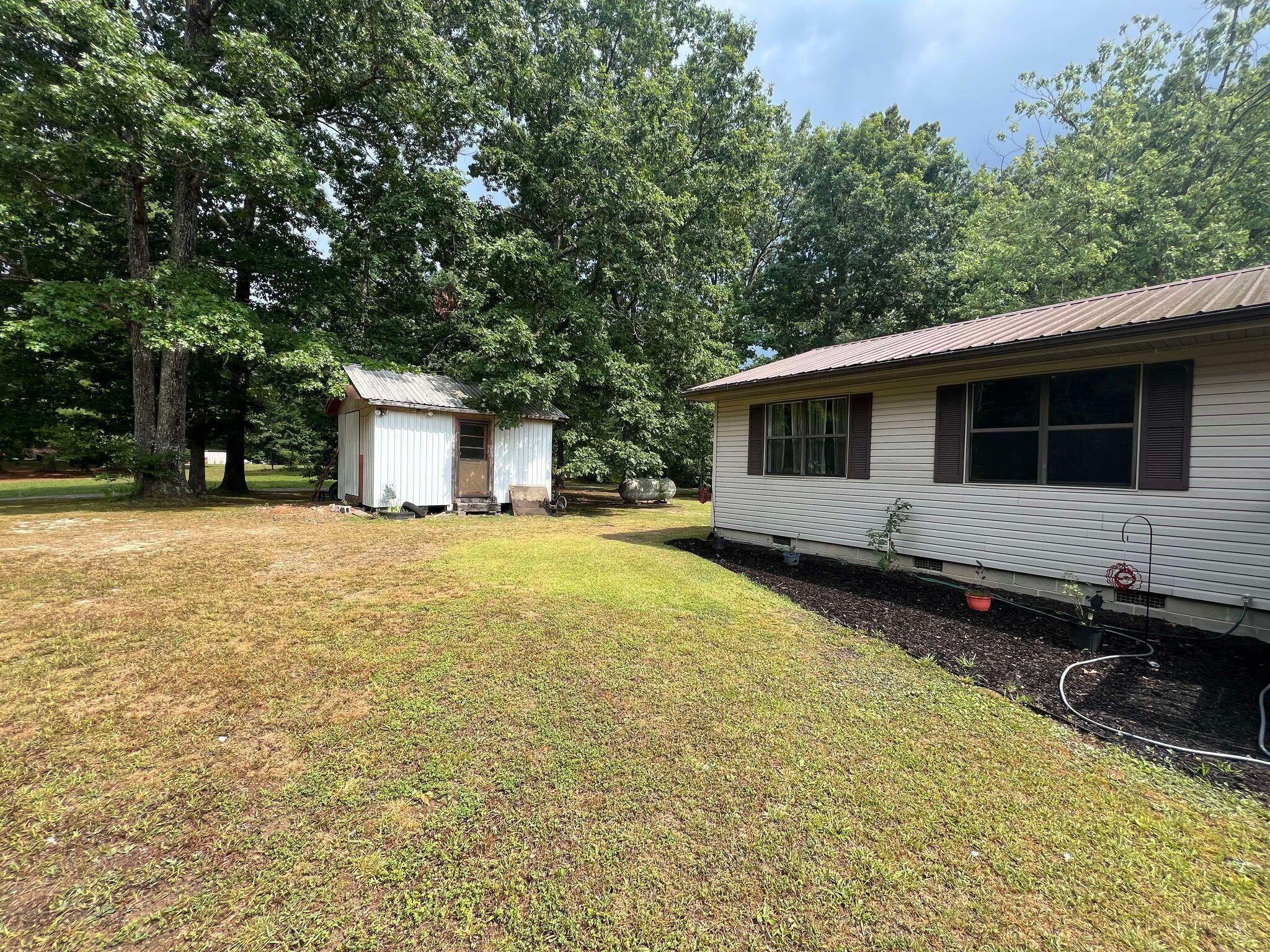 185 Thompson Road Dunlap, TN 37327 - Photo 3 of 25 Side of House