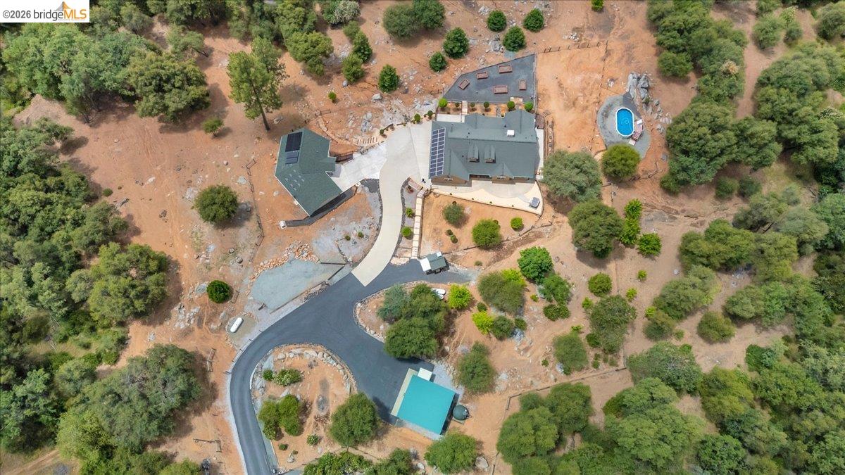 18180 Robin Ridge Road Sonora, CA 95370 - Photo 86 of 88 Extensive property featuring multiple structures, a circular driveway, and a detached pool
