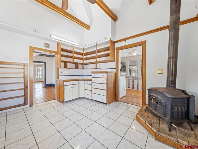 a kitchen with stainless steel appliances granite countertop a stove and a refrigerator