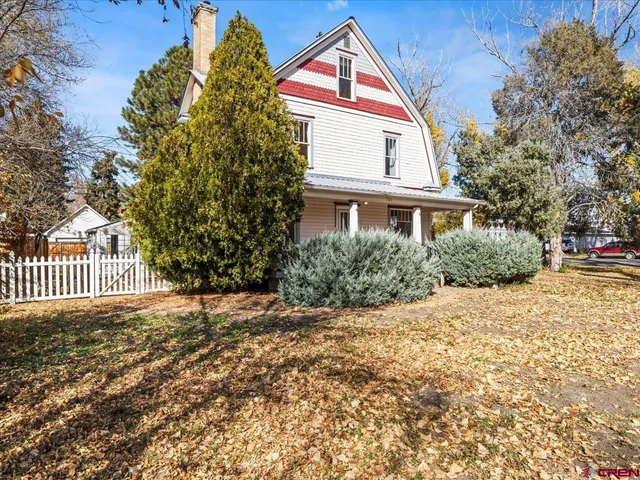 a view of backyard of a house