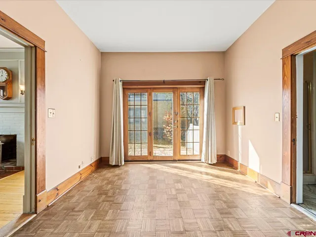 a view of a room with a large window