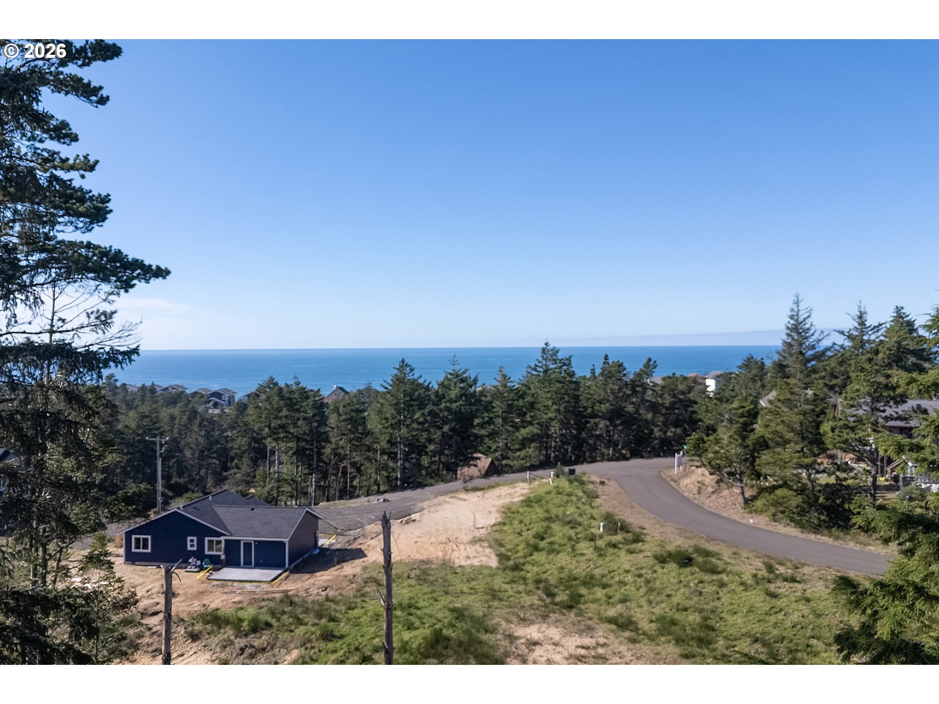 Ava Place, Unit 8 8 Tillamook, OR 97141 - Photo 6 of 12 a view of a house with a yard and outdoor space