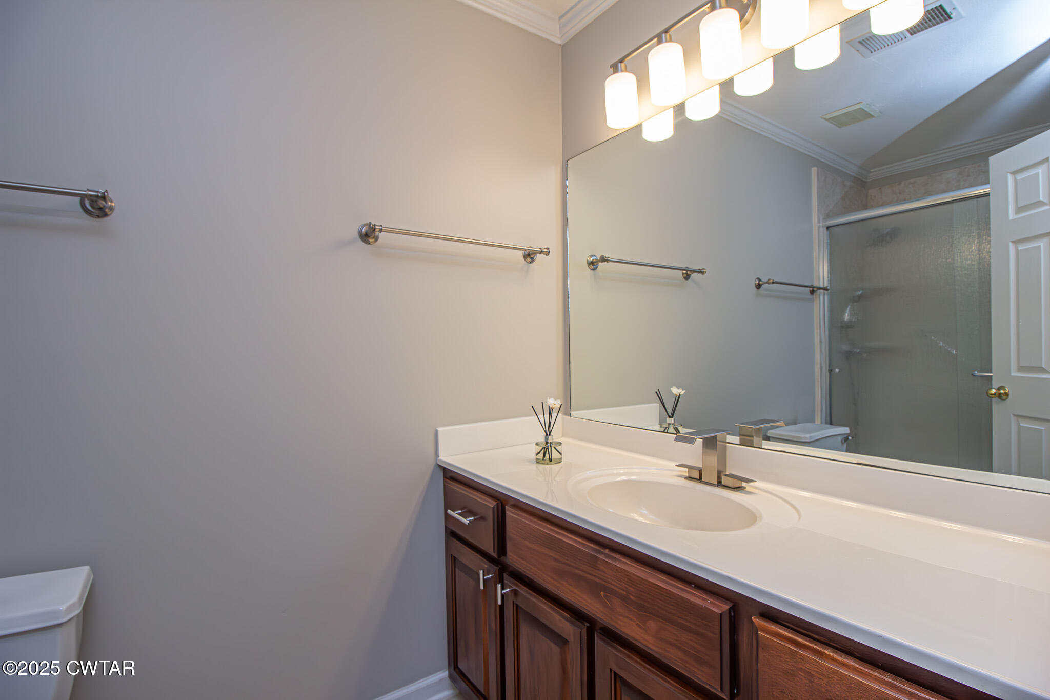 88 Rooker Drive Jackson, TN 38305 - Photo 11 of 20 a bathroom with a sink and a mirror